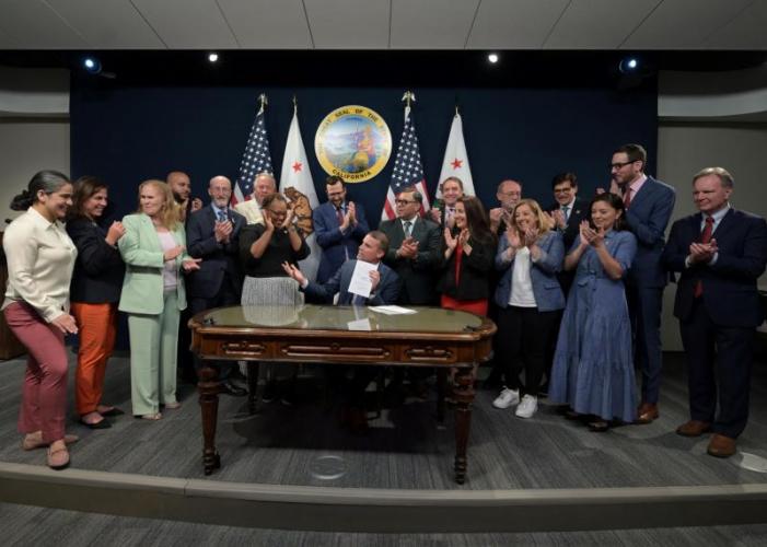 Acting Governor McGuire signs legislation